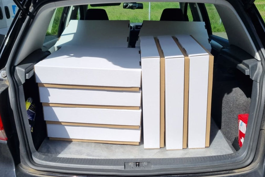 Hoeveel tapijttegels (dozen) kun je zelf vervoeren?