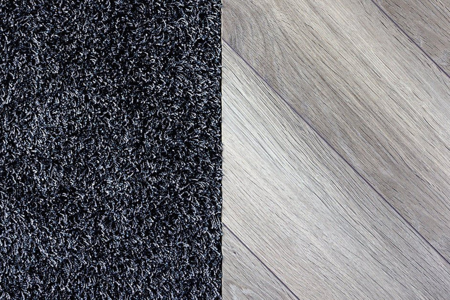 Tapijttegels vs. harde vloeren: Complete vergelijking voor de juiste keuze